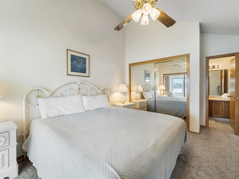 Bedroom 1 - King bed with lakeview on upper level