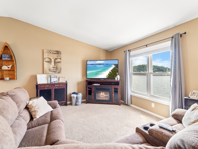 Upper level living area with lakeview