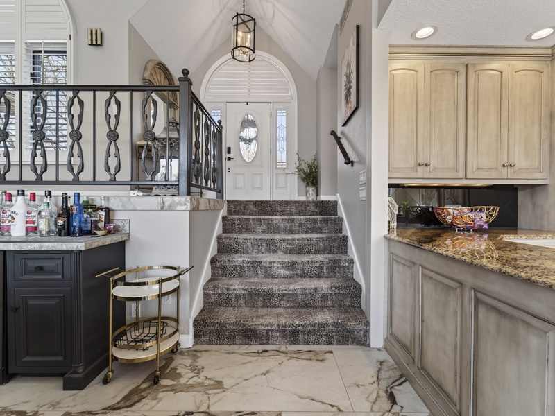 STAIRS TO FRONT FOYER