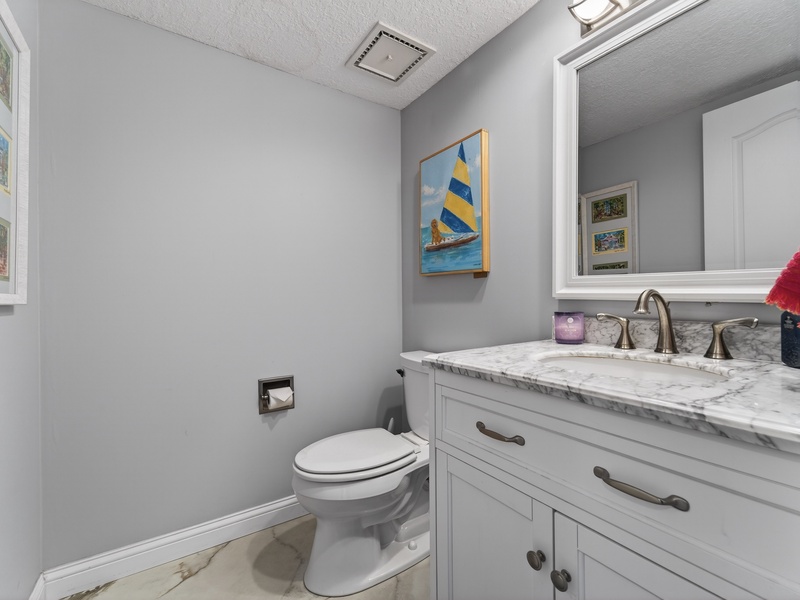 BATHROOM 7 - HALF BATH ON LOWER LEVEL