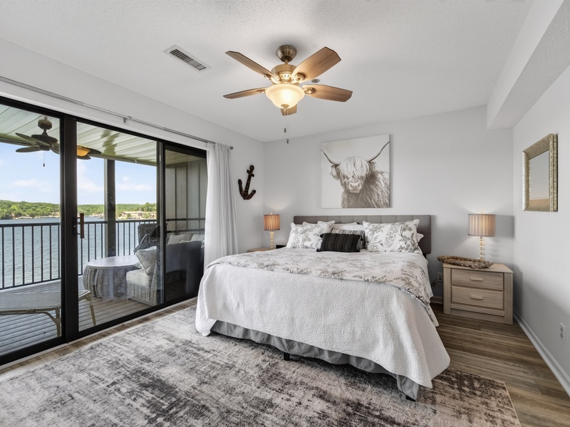 BEDROOM 1 - QUEEN BED WITH LAKE VIEW