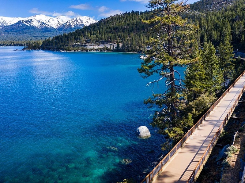 Take the East Shore Trail to Sand Harbor Beach  