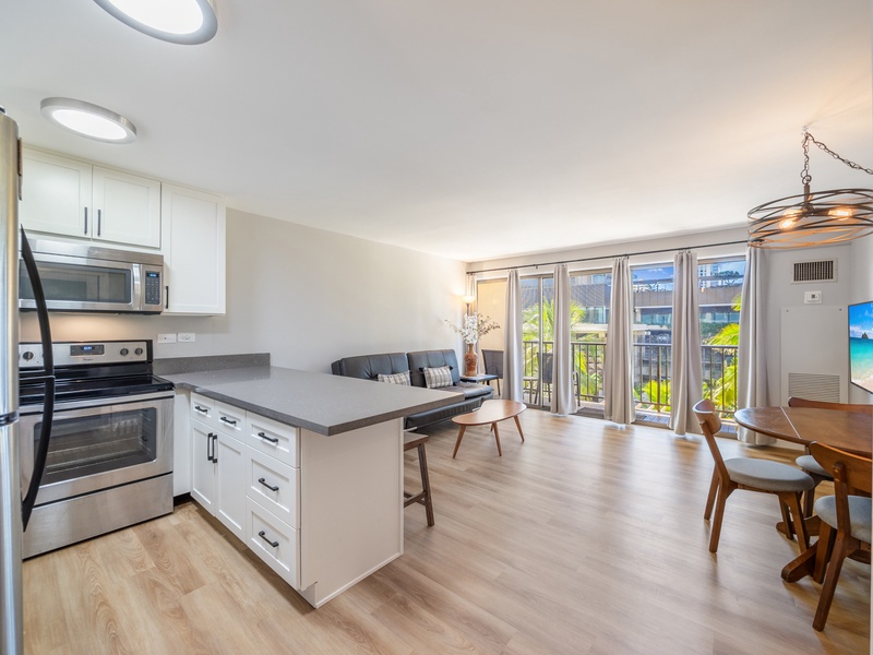 Enjoy an easy flow between the kitchen and living room, designed for comfort and connection during your stay at Four Paddle.