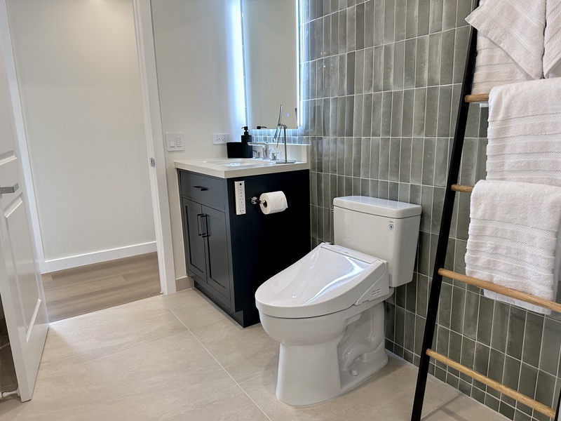 Bathroom with shower toto toilet bidet and LED mirror