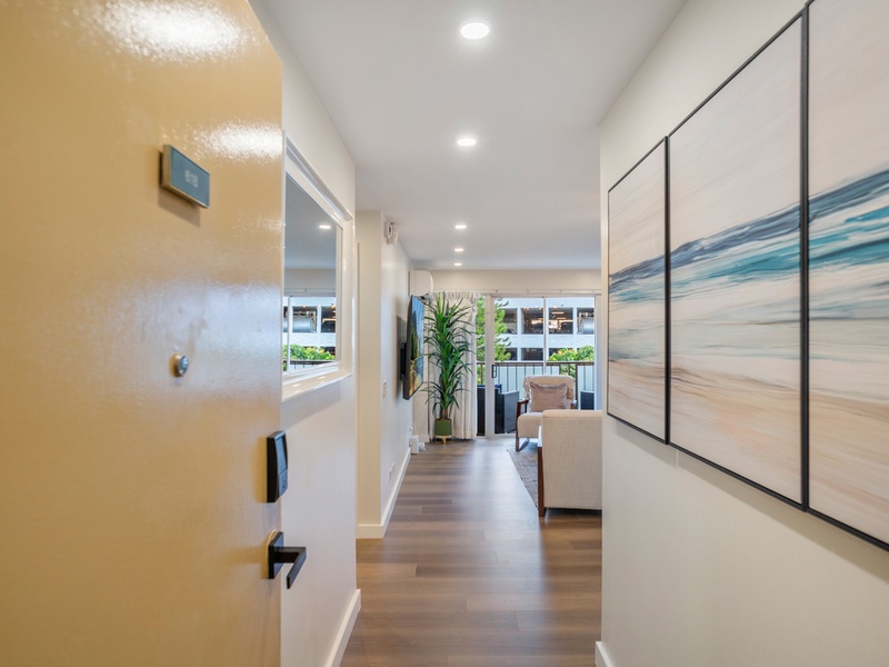 A welcoming entryway sets the tone for your stay; modern, airy, and filled with island charm.