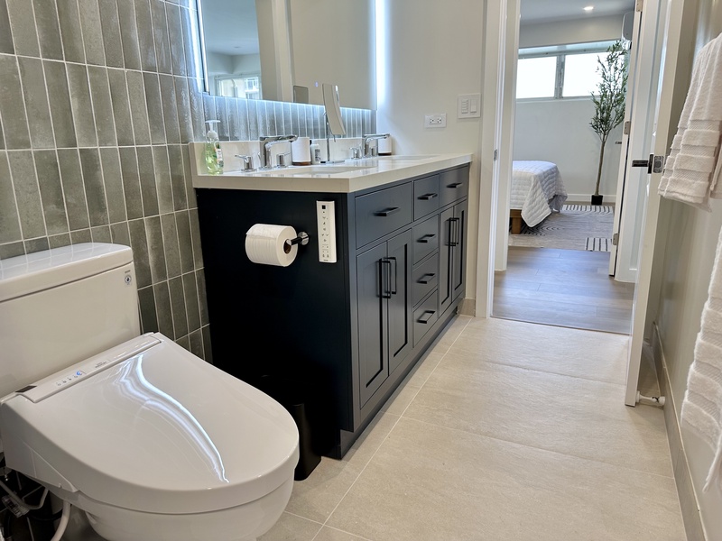 Bathroom with soaking tub toto toilet bidet and LED mirror