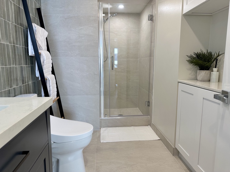 Bathroom with shower toto toilet bidet and LED mirror