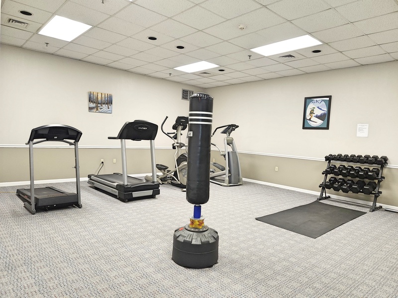 Exercise room downstairs past pool