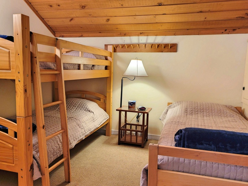 Loft room with twin and twin bunk set
