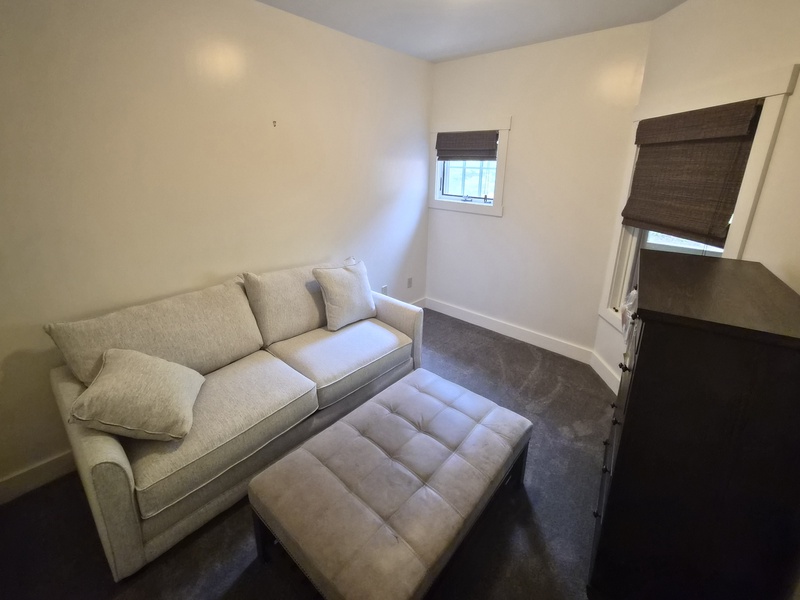 This den, across the hall from the bunk bed room offers a queen size sleep sofa and quiet space removed from the larger living area.