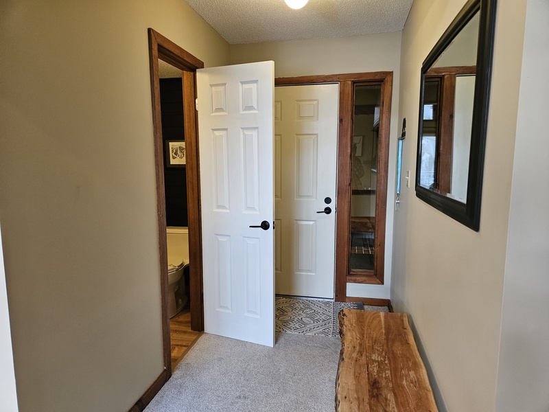 Hall to bath and foyer