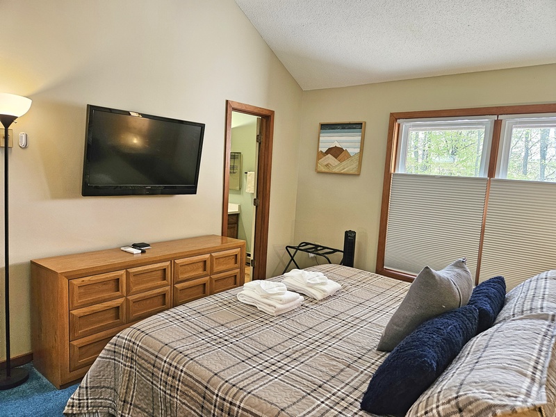King bedroom with TV and private bath