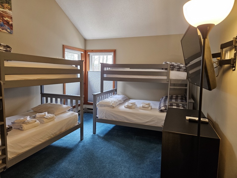 Bunk room from entry, with TV
