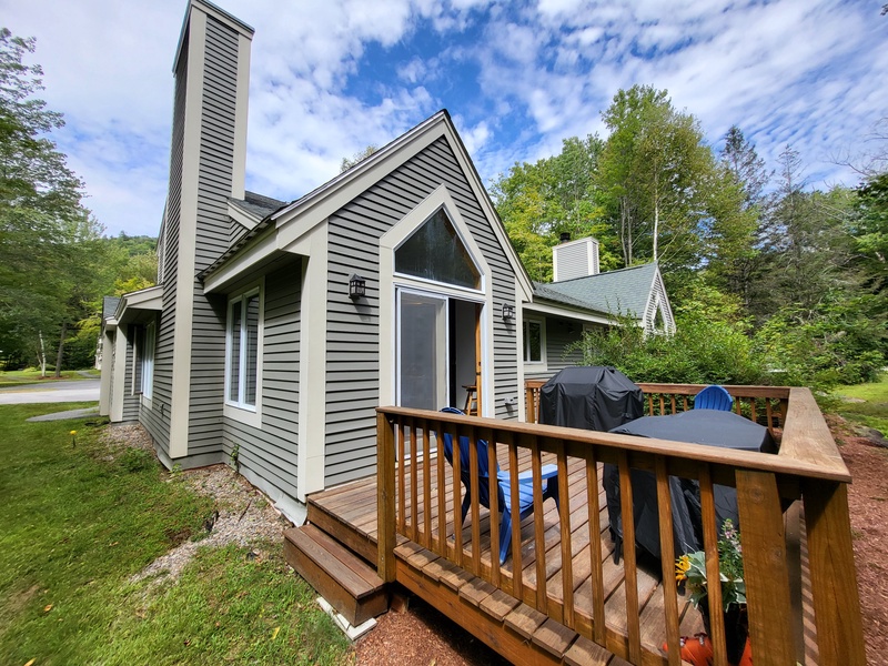 Is an end unit with small deck and side yard.