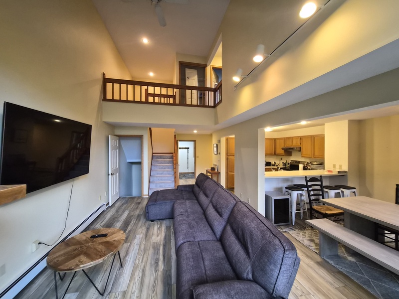 ...features a 55+" TV with comfy seating to enjoy your favorite entertainment.
