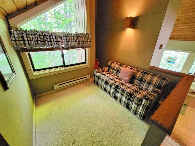 Loft area with sofa
