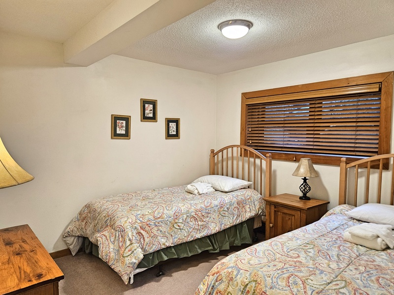 Twin bedroom on left