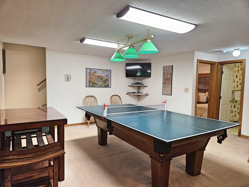 Game room with twins and bath beyond