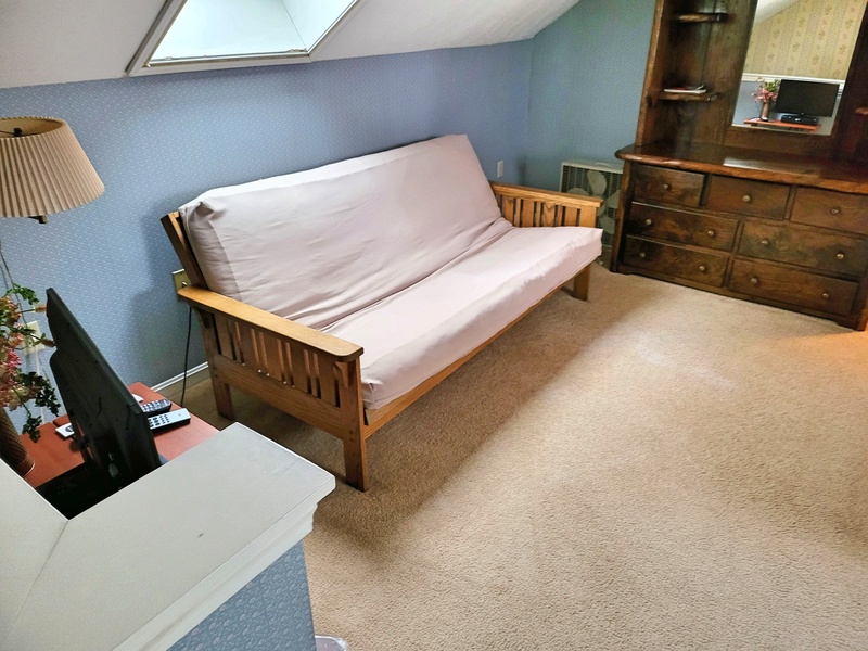 Loft bedroom sitting area