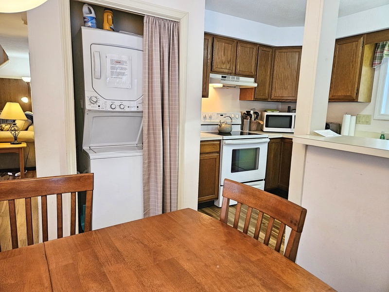Laundry off kitchen/dining area