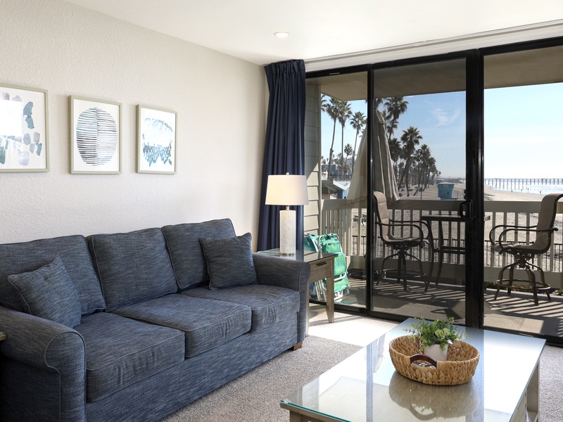Relax in the living room while looking out to the ocean