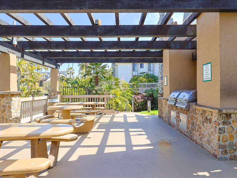 BBQ grills are located next to the large pool in the center of the complex