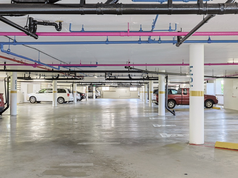 Gated garage with assigned parking space