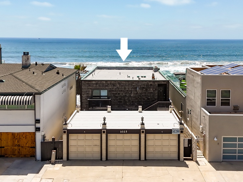 Each floor of the property is a separate unit with its own garage stall.