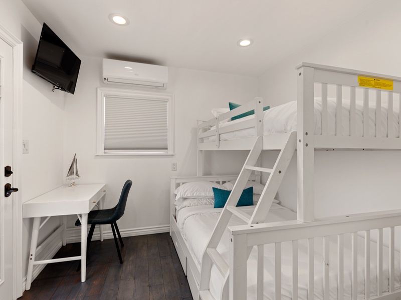 The fourth room offers a Twin over Full bunk bed for added sleeping arrangements
