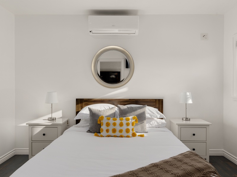 Another guest bedroom offers a Queen bed