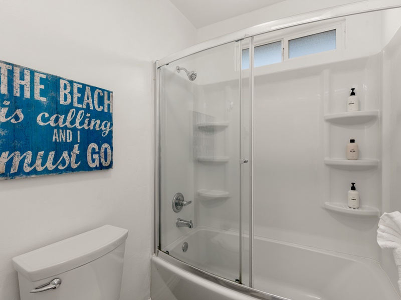 The guest bathroom offers a shower/tub combo