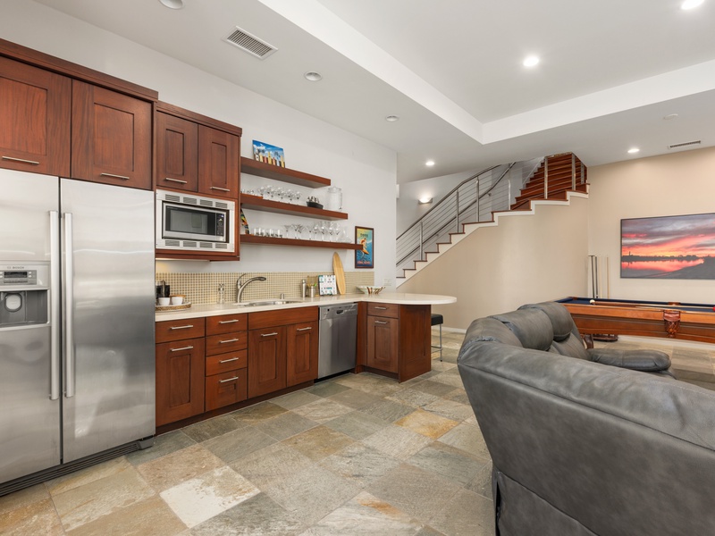 Family room and pool deck access from the lower level. 