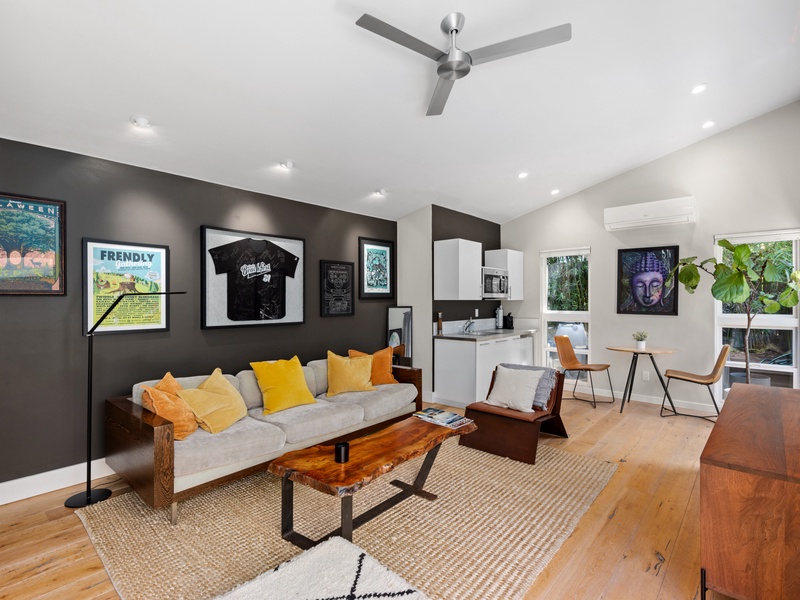 A kitchenette, office space, bathroom, and living area make the perfect space for extra accommodations. 