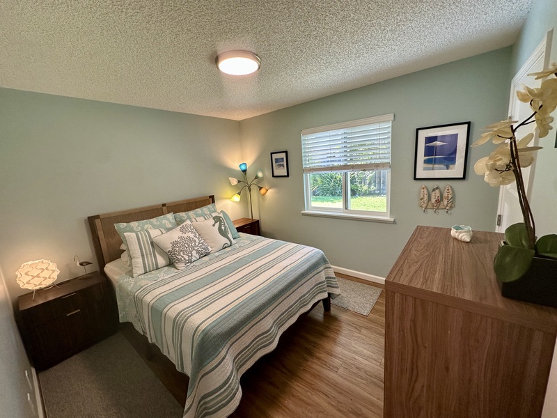 The third bedroom has a queen bed.