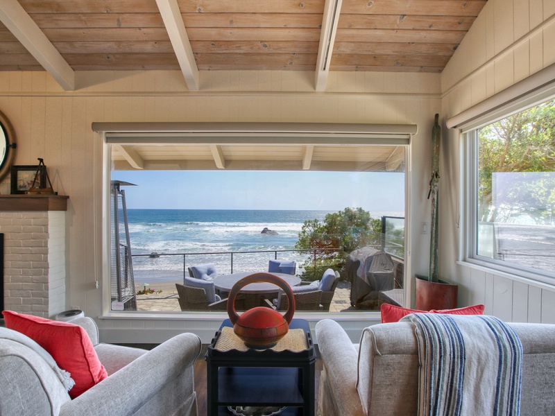 Front-row ocean views from the deck. The perfect spot to pivot between the conversation and the coastline.