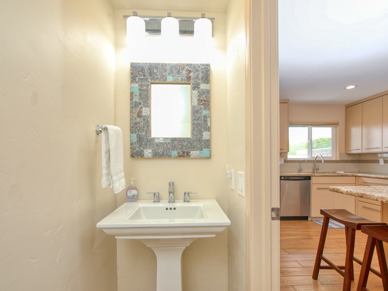 The unit features 2½ bathrooms, including a half-bath conveniently located off the living area.