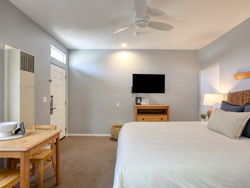 Chill, relax, repeat! Oyster Loft has a king bed, SmartTV, ceiling fan, beach towels, and a sweet little dining nook for two. Perfect beach stay!