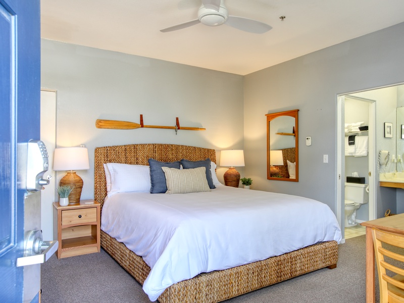 Welcome to Oyster Outlook, Unit 105! This cozy downstairs studio features a comfy queen bed and a compact kitchenette—perfect for your seaside escape. 
