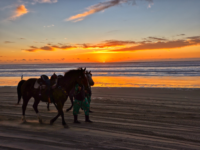 Riding horseback along Oceano’s beach, with the waves at your side and dunes in the distance.