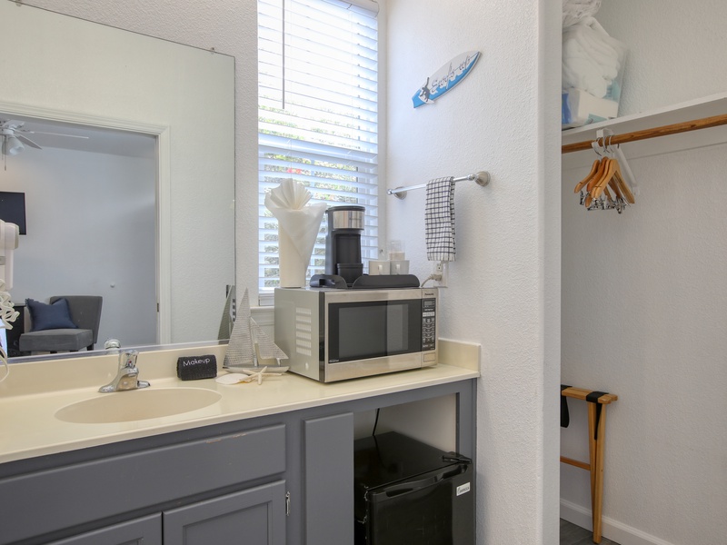 Enjoy the flexibility of a compact kitchenette, complete with a mini-fridge, microwave, and coffee maker.