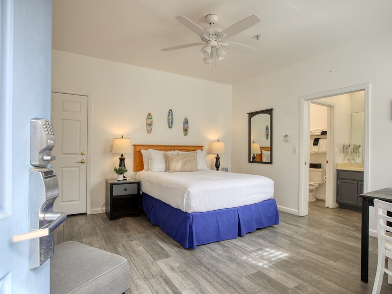 Welcome to The Shark Shack, Unit 303! This cozy downstairs studio features a comfy queen bed and a compact kitchenette—perfect for your seaside escape. 