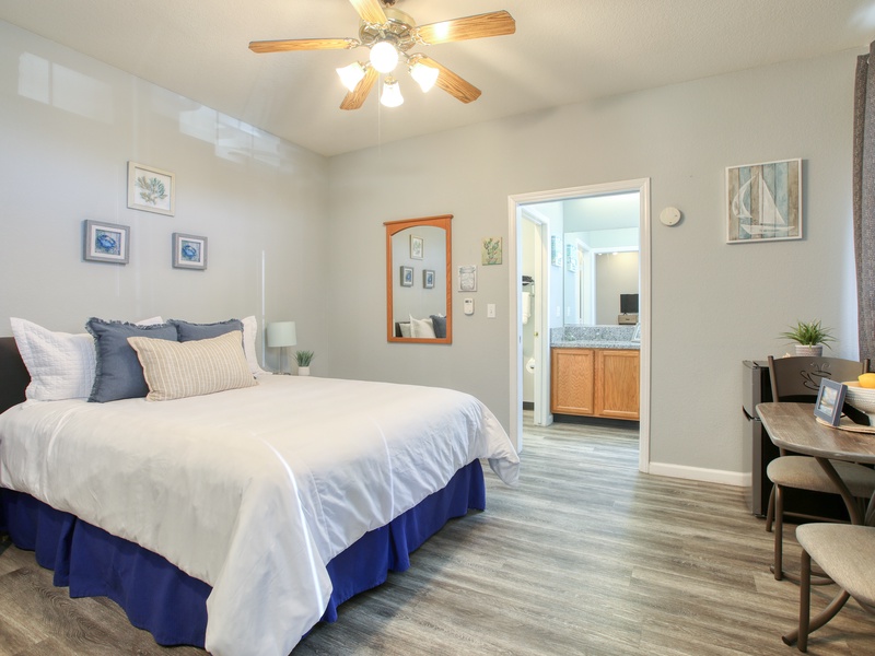 Welcome to Salty Studio, Unit 603! This cozy downstairs studio features a comfy queen bed and a compact kitchenette—perfect for your seaside escape. 