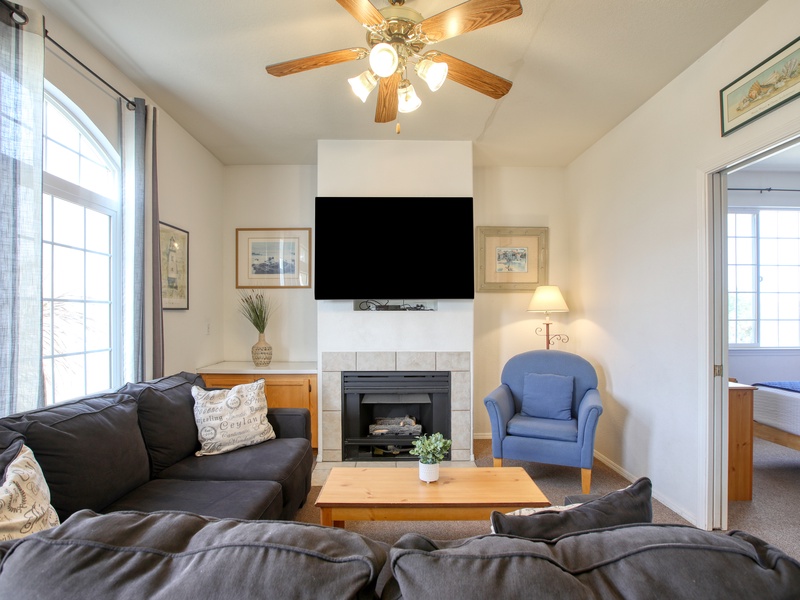This downstairs one-bedroom condo features a large sectional for everyone to relax and enjoy!