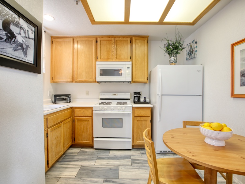 Upgraded flooring, a dining table for three and fully stocked kitchen for those after beach dinners! 
