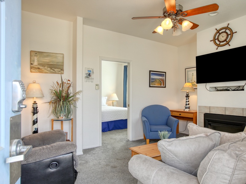 Who doesn't love a recliner? Kick back, listen to the waves and watch your favorite show in this spacious living room. 