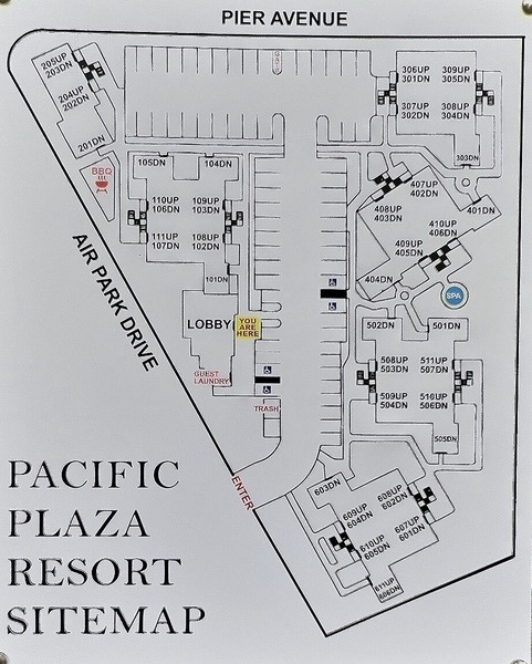 The Pacific Plaza Resort features six coastal-style condos with shared amenities like a laundry center, hot tub, barbecue, and picnic area.
