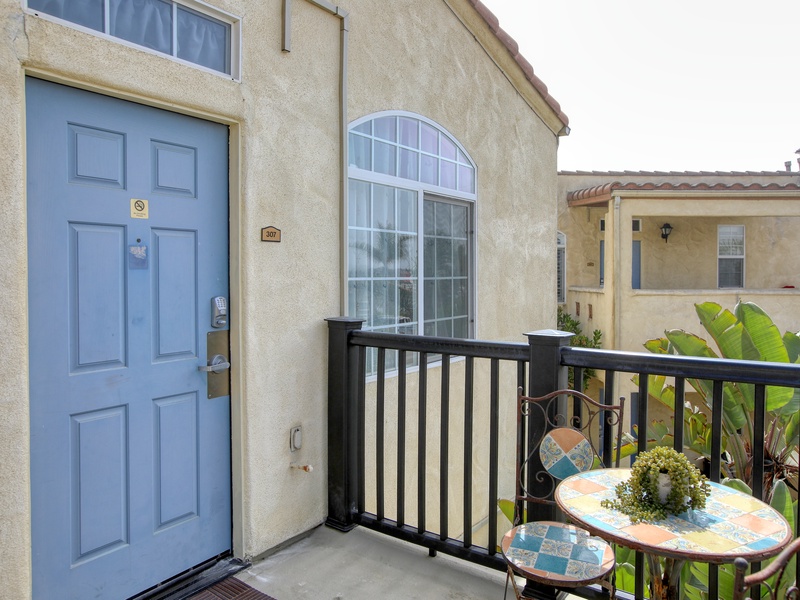A private balcony and tiled bistro table for enjoying that morning cup of coffee! 