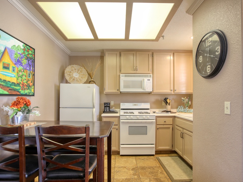 Start your mornings right — cozy kitchen with a coffee machine ready to brew.