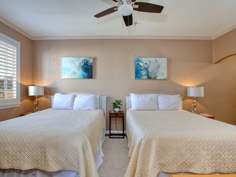 Spacious Sleeping Quarters Why settle for a cramped stay? Our bedroom features two plush queen-sized beds with premium linens, making this the perfect retreat.