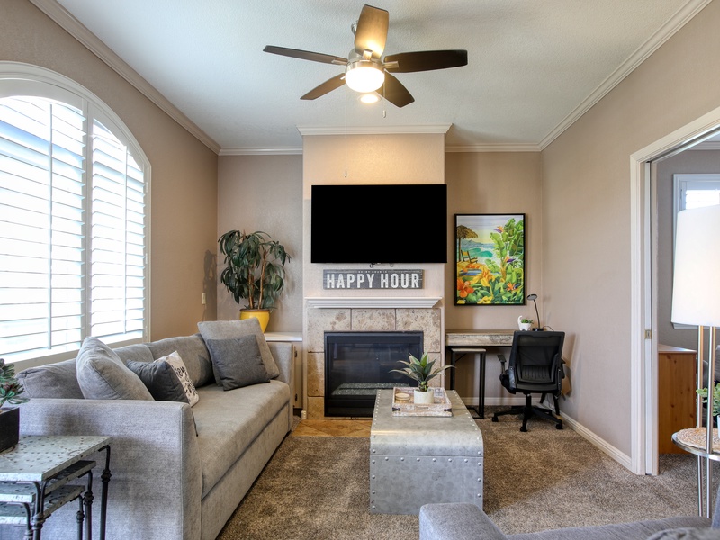 Unwind in this cozy, sunlit living room — the perfect spot to relax after a day of exploring.